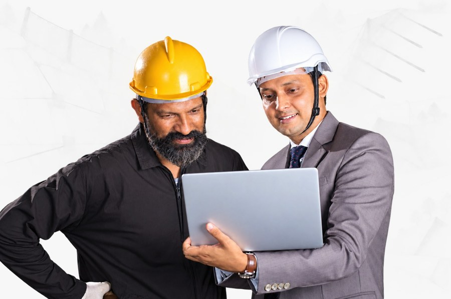 GeoTech engineers reviewing a design on site